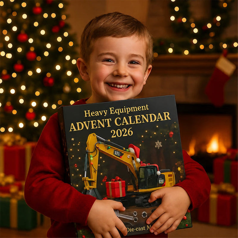 Miniatur-Bulldozer und Kran aus dem Baufahrzeug-Adventskalender